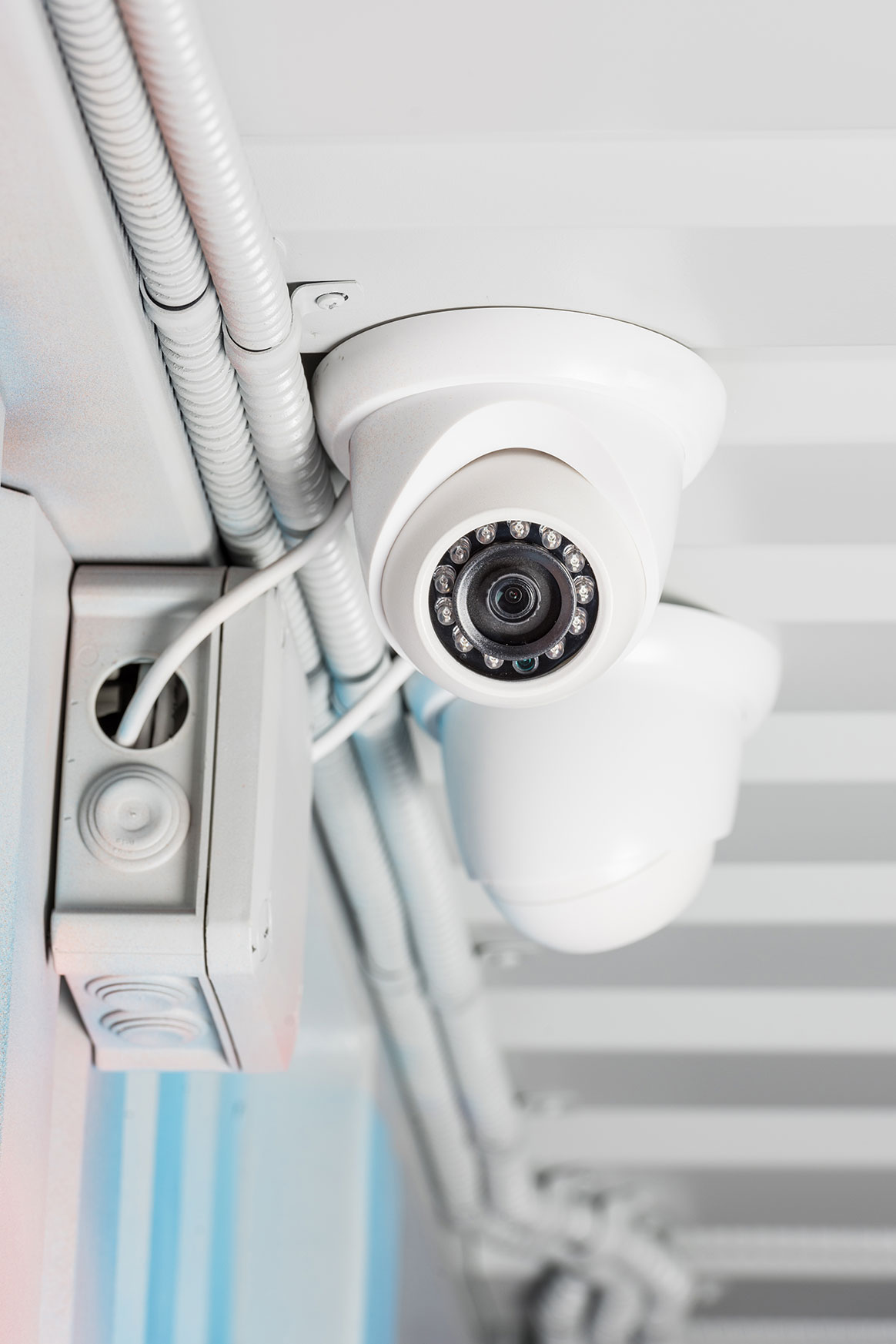 white-security-camera-on-ceiling-home-security-sys